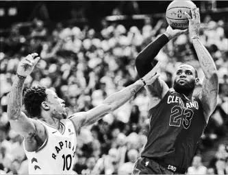  ?? FRANK GUNN CANADIAN PRESS FILE PHOTO ?? LeBron James is showing DeMar DeRozan how this game is played with off-balance shots and buzzer-beaters.