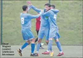  ??  ?? Oscar Wagner (centre) celebrates his winner