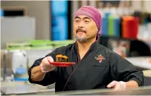  ??  ?? New Plymouth sushi pioneer Ken Kurota runs the city’s first and only sushi train.