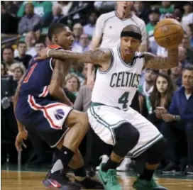  ?? CHARLES KRUPA — THE ASSOCIATED PRESS FILE ?? Isaiah Thomas (4) drives to the basket during a pllayoff game in Boston.