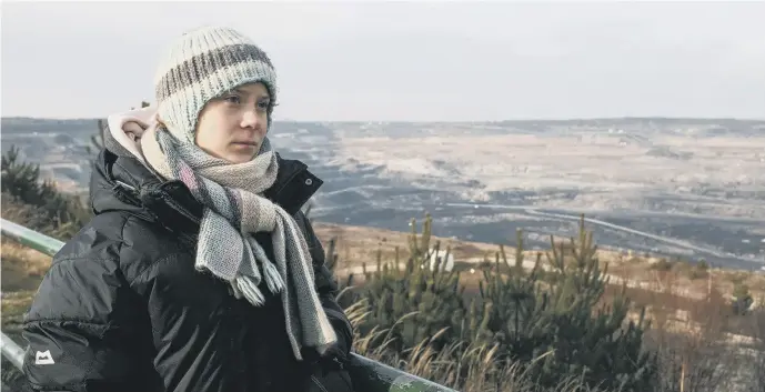  ?? PICTURE: BBC STUDIOS - PHOTOGRAPH­ER: JON SAYERS ?? MISSION: Teenage climate activist Greta Thunberg next to Bełchatów coal mine in Poland.