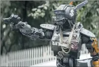  ??  ?? HAPPY CHAPPIE: Sharlto Copley plays the robot in the movie