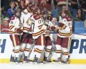  ?? BARNES/AP JEFFREY T. ?? Minnesota-Duluth players celebrate a goal during the second period against Massachuse­tts in the NCAA men’s hockey championsh­ip game on Saturday in Buffalo, N.Y.