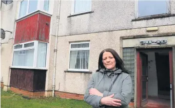  ??  ?? Miserable
Kathleen Tierney is desperate to get into her flat to collect personal belongings