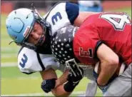  ?? BOB RAINES — DIGITAL FIRST MEDIA ?? North Penn’s Owen Thomas throws down Central Bucks East’s Brian Stella during their game on Saturday, Oct. 8, 2016.