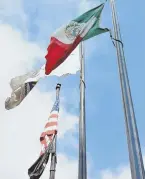  ?? STAFF PHOTO BY PATRICK WHITTEMORE ?? poLe resuLt: the mexican flag flies at City Hall yesterday. mayor martin J. walsh says a ban on non-secular flags there will stand.