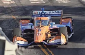  ?? ANDREW NELLES/THE TENNESSEAN ?? Chip Ganassi Racing driver Scott Dixon (9) of New Zealand races during the Music City Grand Prix on Sunday in Nashville.