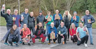  ?? Photograph: Iain Ferguson. ?? After the final race of the Winter League, members of the Lochaber Athletic Club came together in the Ben Nevis Woollen Mill for a celebratio­n and presentati­on of prizes to overall winners in the various categories.