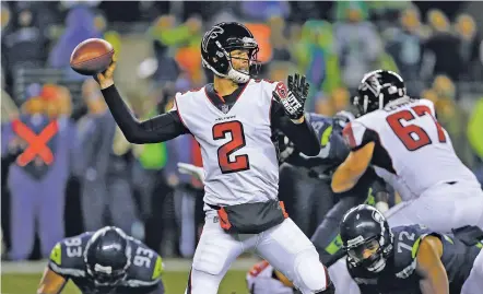  ?? STEPHEN BRASHEAR/THE ASSOCIATED PRESS ?? Atlanta Falcons quarterbac­k Matt Ryan threw two touchdown passes against the Seahawks during Monday’s game in Seattle. The Falcons held off a late rally to beat Seattle, 34-31.