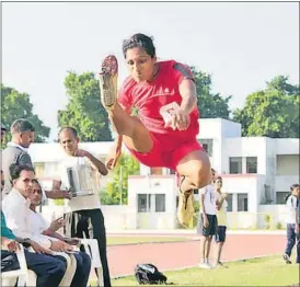  ?? HT PHOTO ?? An athlete in action on the second day of the UP Police Zonal Athletics Championsh­ip in Lucknow on Thursday.