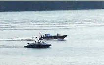  ?? PHOTO COURTESY JACK KOWALSKI ?? The allegedly stolen boat, at top in photo, was chased down the St. Lawrence River and eventually recovered.