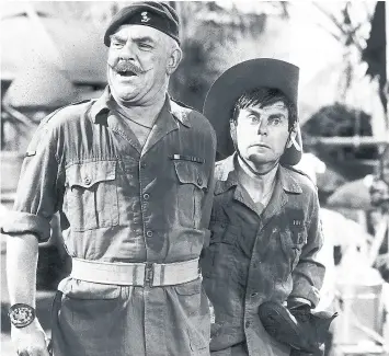  ??  ?? Windsor Davies and Melvyn Haynes in It Ain’t Half Hot Mum.