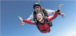  ??  ?? Mandy McPike on the tandem skydive and, right, ready to go