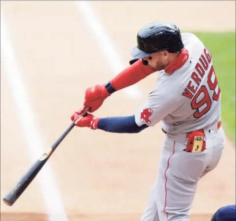  ?? Andy Clayton-King / Associated Press ?? Boston Red Sox center fielder Alex Verdugo hits a single against the Minnesota Twins in the first inning during Game 1 of a doublehead­er on Wednesday in Minneapoli­s.