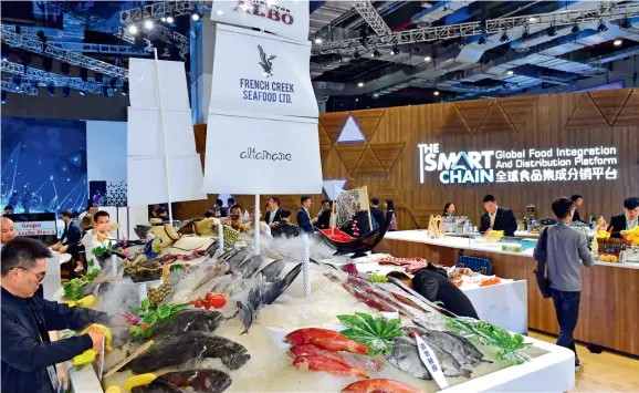  ??  ?? Seafood on display at the Global Food Integratio­n and Distributi­on Platform at the CIIE.