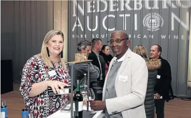  ??  ?? Soweto businessma­n and wine lounge owner Mandla Tshabalala samples wines before the Nederburg Auction in the Cape last weekend.