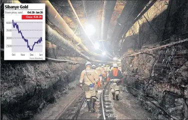  ?? PHOTO: SUPPLIED ?? LONG WALK: Mineworker­s make their way down a tunnel at Sibanye Gold’s Ya Rona shaft, level 33, in Carletonvi­lle.