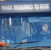  ?? Steve Gonzales / Staff file photo ?? A Metro bus operator waits for passengers at the Wheeler Transit Center. Riders must wear masks.