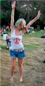  ?? AFP ?? A Bernie Sanders supporter dances to music. —