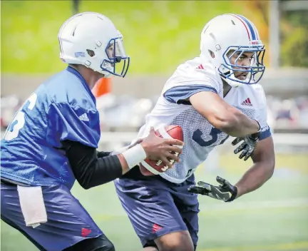  ?? JOHN MAHONEY ?? Running back William Stanback, right, has impressed Alouettes coaches with his mix of size, agility, versatilit­y and ability to read the line of scrimmage during training camp. Stanback, 23, is hoping to earn a backup spot with the Montreal squad...