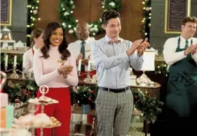  ?? Lifetime ?? Tiya Sircar and Joe Dinicol star in “Christmas 9 to 5” on Lifetime.