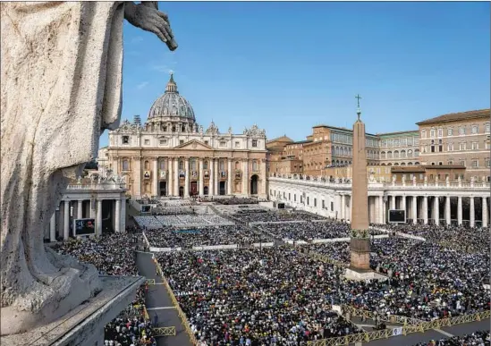 ?? Antonio Masiello For The Times ?? TENS OF THOUSANDS of people fill St. Peter’s Square in Vatican City to witness the canonizati­on of Archbishop Oscar Romero and six others by Pope Francis.
