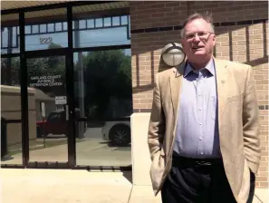  ?? The Sentinel-Record/Donald Cross ?? ■ Garland County Sheriff Mike McCormick stands at the entrance to the Garland County Juvenile Detention Center, located at 222 Woodbine St., which will be closed effective July 15 due to the low number of juveniles being detained there.