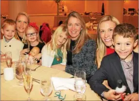  ??  ?? William, Marje and Emma Armstrong of Villanova share a table with fellow residents Maia and Tamara Kammann and Malvernite­s Irene and Drew Nudy.