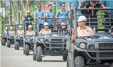  ?? ?? Elite force: ahmad Zahid (right) riding in a utility task vehicle during the nadma Mandate Ceremony for 2024 at the Smart headquarte­rs in Puchong. — Bernama