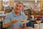  ?? NETFLIX ?? Phil Rosenthal is the host of“Somebody Feed Phil.”