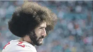  ?? Lynne Sladky Associated Press ?? NO LONGER an NFL member in good standing, quarterbac­k Colin Kaepernick stirred controvers­y last year by kneeling during the national anthem to protest social injustice.