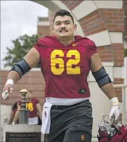  ?? Michael Owen Baker For The Times ?? USC OFFENSIVE LINEMAN Brett Neilon graduated last year with his bachelor’s degree and is working on his master’s degree in entreprene­urship.