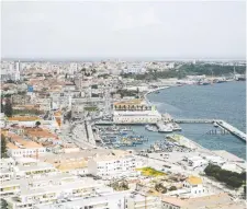  ??  ?? A panoramic view from above the port city of Setúbal, which is more affordable than Lisbon and also “more authentic and close to nature.”