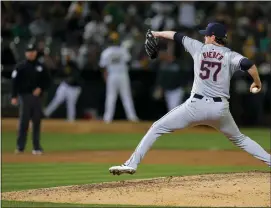  ?? GODOFREDO A. VÁSQUEZ — THE ASSOCIATED PRESS ?? Shane Bieber throws to an Athletics batter during the sixth inning March 28in Oakland, Calif.