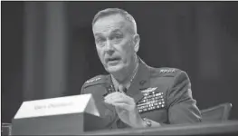  ?? The Associated Press ?? AIRSTRIKES: In this Oct. 27 photo, Joint Chiefs Chairman Gen. Joseph Dunford, Jr. testifies on Capitol Hill in Washington. In measuring progress in the American-led air war against the Islamic State in Syria and Iraq, numbers tell one story, but...