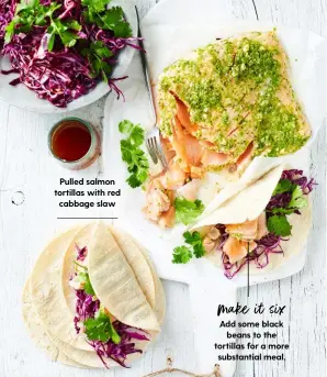  ??  ?? Add some black beans to the tortillas for a more substantia­l meal. Pulled salmon tortillas with red cabbage slaw