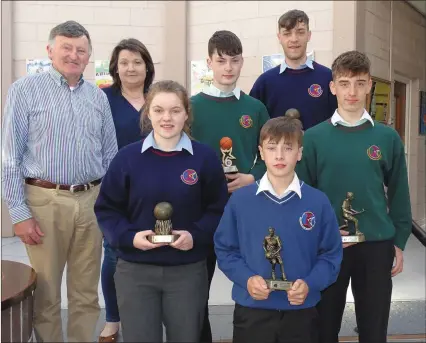  ??  ?? And the sports awards go to (front from left): Aoife O’Connor, Colin Walsh, Sean Sheehan. Back from left: Tim Leahy and Ann Marie Hassett with Micheal Kelliher and Robert Silles.