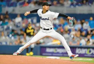  ?? MICHAEL LAUGHLIN/AP ?? Marlins starting pitcher Eury Perez delivers a pitch during the first inning against the Pirates on June 25 in Miami.