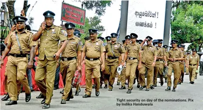  ?? Pix by Indika Handuwala ?? Tight security on day of the nomination­s.