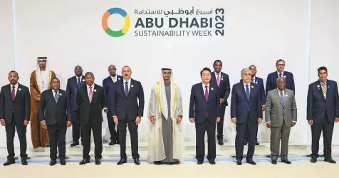  ?? WAM ?? President His Highness Shaikh Mohammad Bin Zayed Al Nahyan with heads of state and government during the opening ■ ceremony of Abu Dhabi Sustainabi­lity Week (ADSW 2023) at Abu Dhabi National Exhibition Centre (Adnec) yesterday.