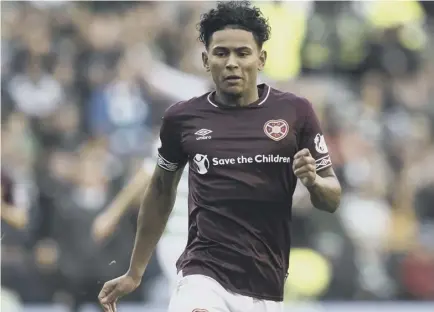  ??  ?? 2 Demetri Mitchell is enjoying the competitio­n with Ben Garuccio for the left-back position at Tynecastle.