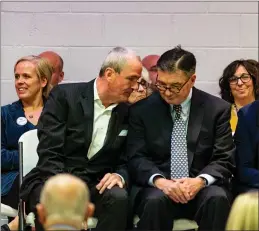  ?? RICH HUNDLEY III — FOR THE TRENTONIAN ?? New Jersey Gov. Phil Murphy (left) talks to Mercer County Executive Brian Hughes at Shiloh Baptist Church in Trenton Monday, Nov. 4, 2019.