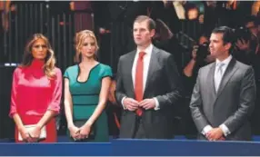  ??  ?? From left, President-elect Donald Trump’s wife, Melania, daughter Ivanka, and sons Eric and Donald Trump Jr. attend the October town hall debate in St Louis. Trump is putting the siblings in charge of his family business. Getty Images