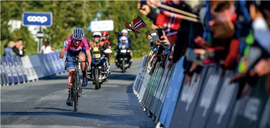  ??  ?? Annemiek van Vleuten celebrates winning stage 3 of the Tour of Norway atop the Norefjell climb