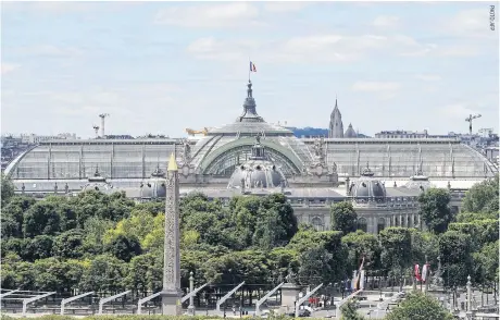  ??  ?? A view of the Grand Palais and Place de la Concorde (foreground), undergoing preparatio­ns for summertime ceremonies.