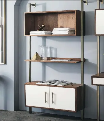  ??  ?? West Elm’s Linden Mid-Century Wide Storage Shelf Unit takes advantage of vertical space. Keep beautiful items or things you use often on the open shelving while stashing less attractive items behind the cupboard doors.