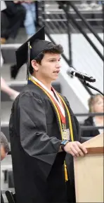  ??  ?? Senior class president Iaian Mullikin welcomed students, family members and friends to the 2021 Pea Ridge High School graduation ceremony Saturday, May 15.