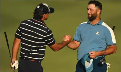  ?? ?? Brooks Koepka shakes hands with Jon Rahm on the 18th green. Photograph: Brendan Moran/Sportsfile/Getty Images