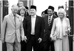  ??  ?? Yang di-Pertuan Agong, Sultan Muhammad V, with Prince Charles and his wife, Camilla at the Istana Negara in Kuala Lumpur. - Bernama photo