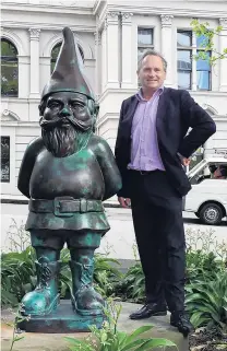  ?? PHOTO: NZME ?? No more gnome. . . Gow Langsford Gallery director John Gow (right) with Thinker, a 2mtall bronze statue stolen over Christmas.